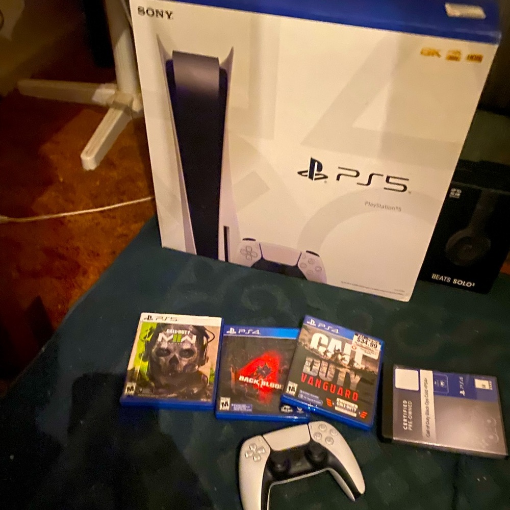 PS5 with 4 games and controller